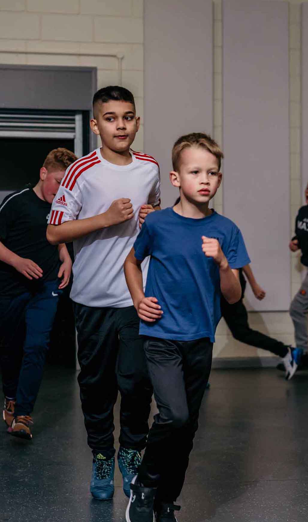 Boxing Academy pupils doing a running exercise Boxing Academy pupils doing a running exercise