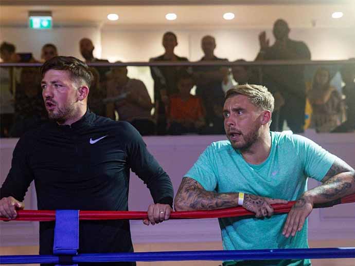 Jordan Reynolds ringside with his head coach Jake Jordan Reynolds ringside with head coach Jake
