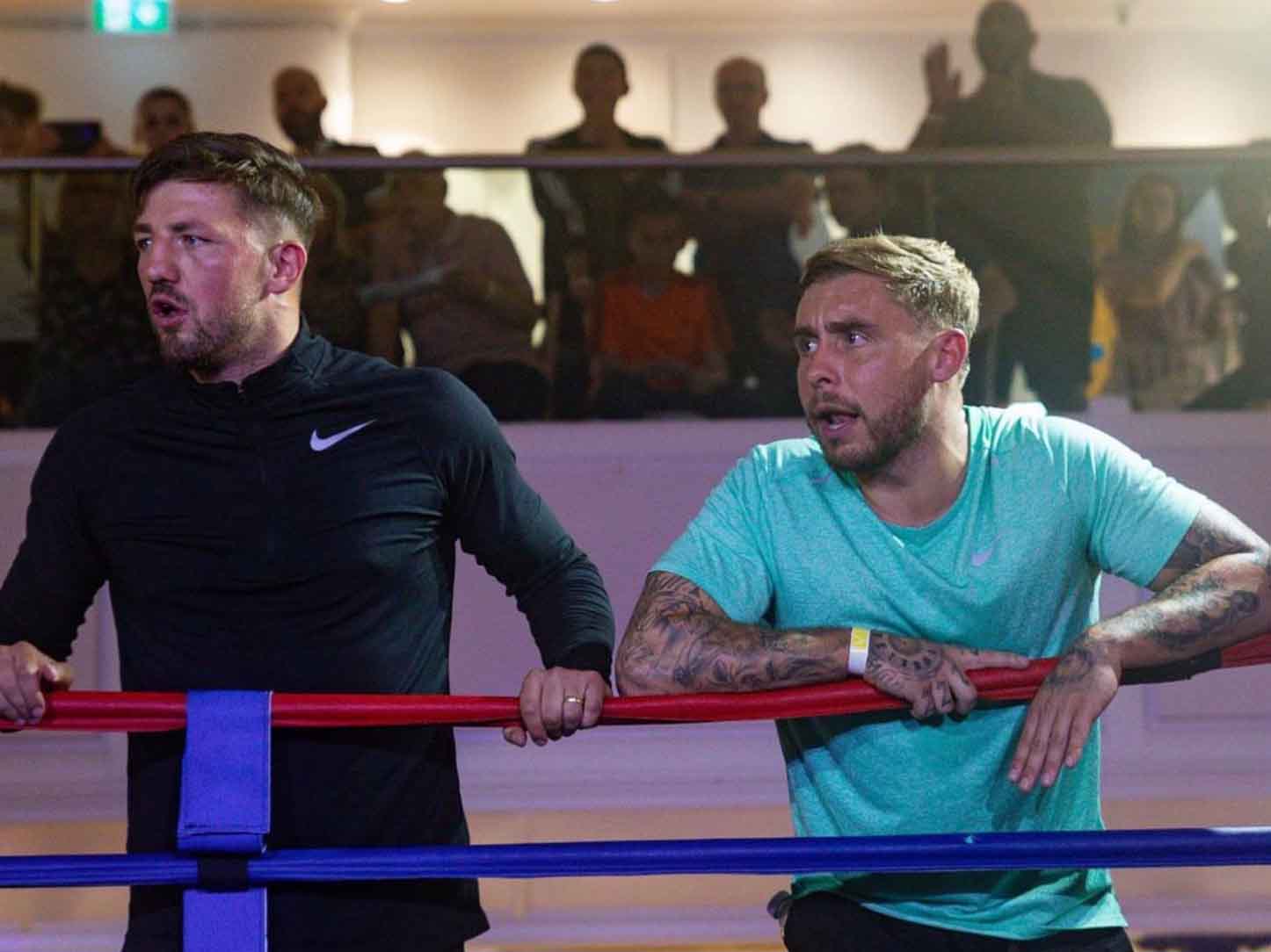 Jordan Reynolds ringside with head coach Jake Jordan Reynolds ringside with head coach Jake