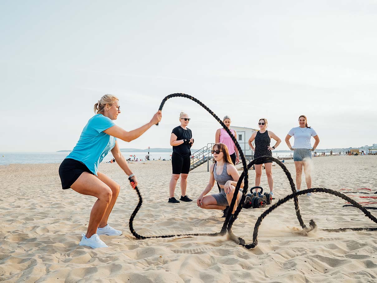 Fitness workouts with coach on the beach Fitness workouts with coach on the beach